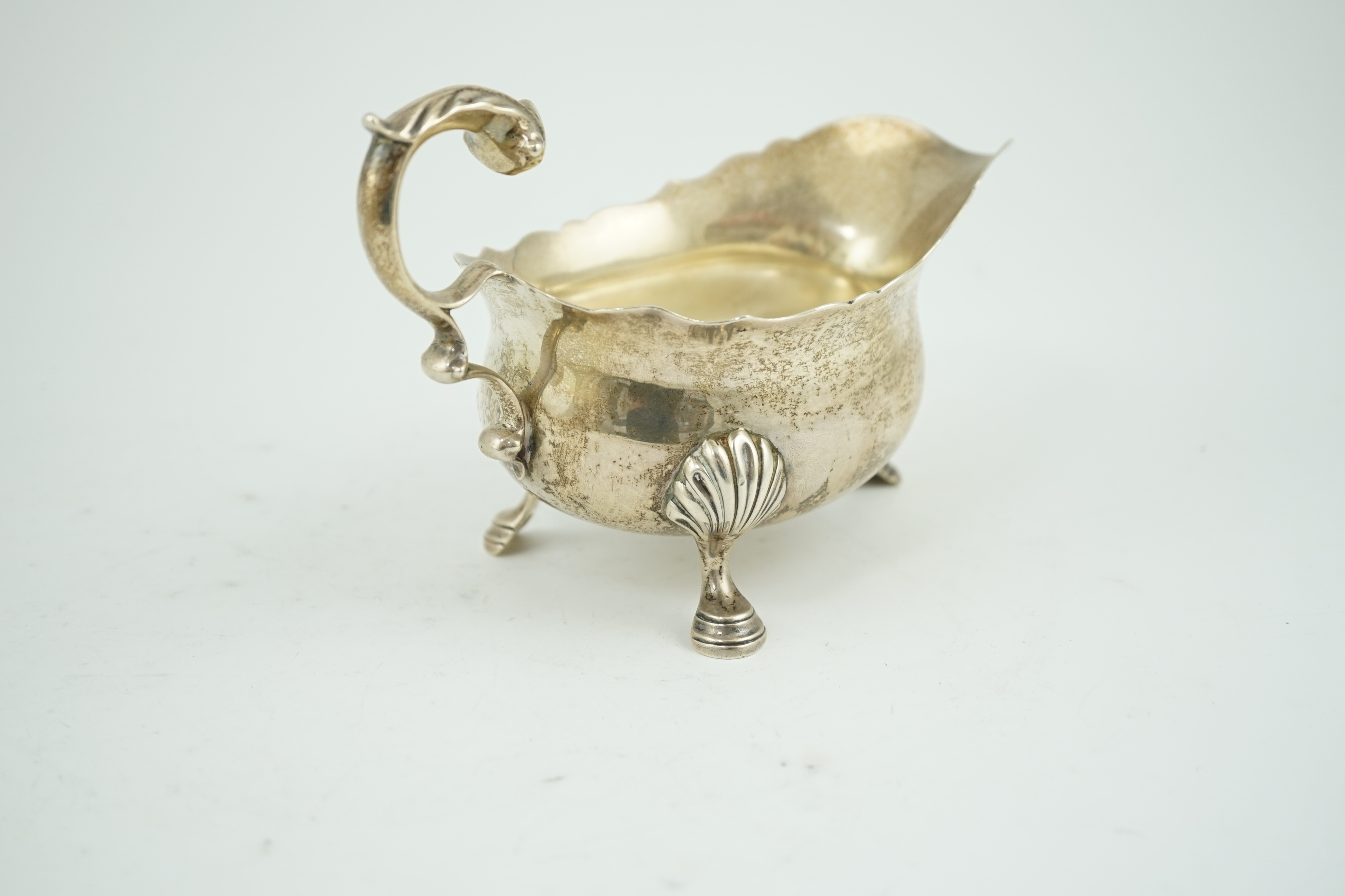 A George V silver sauce boat, by Edward Barnard & Sons Ltd